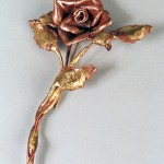 Rose Pin made from copper and bronze.