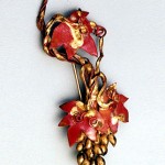 Detailed Coppered and bronze Grapevine Pin.