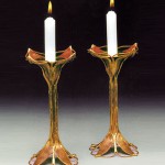 Copper and bronze candle holders.