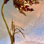 Handcrafted copper botanical wall sculpture displayed in a home interior